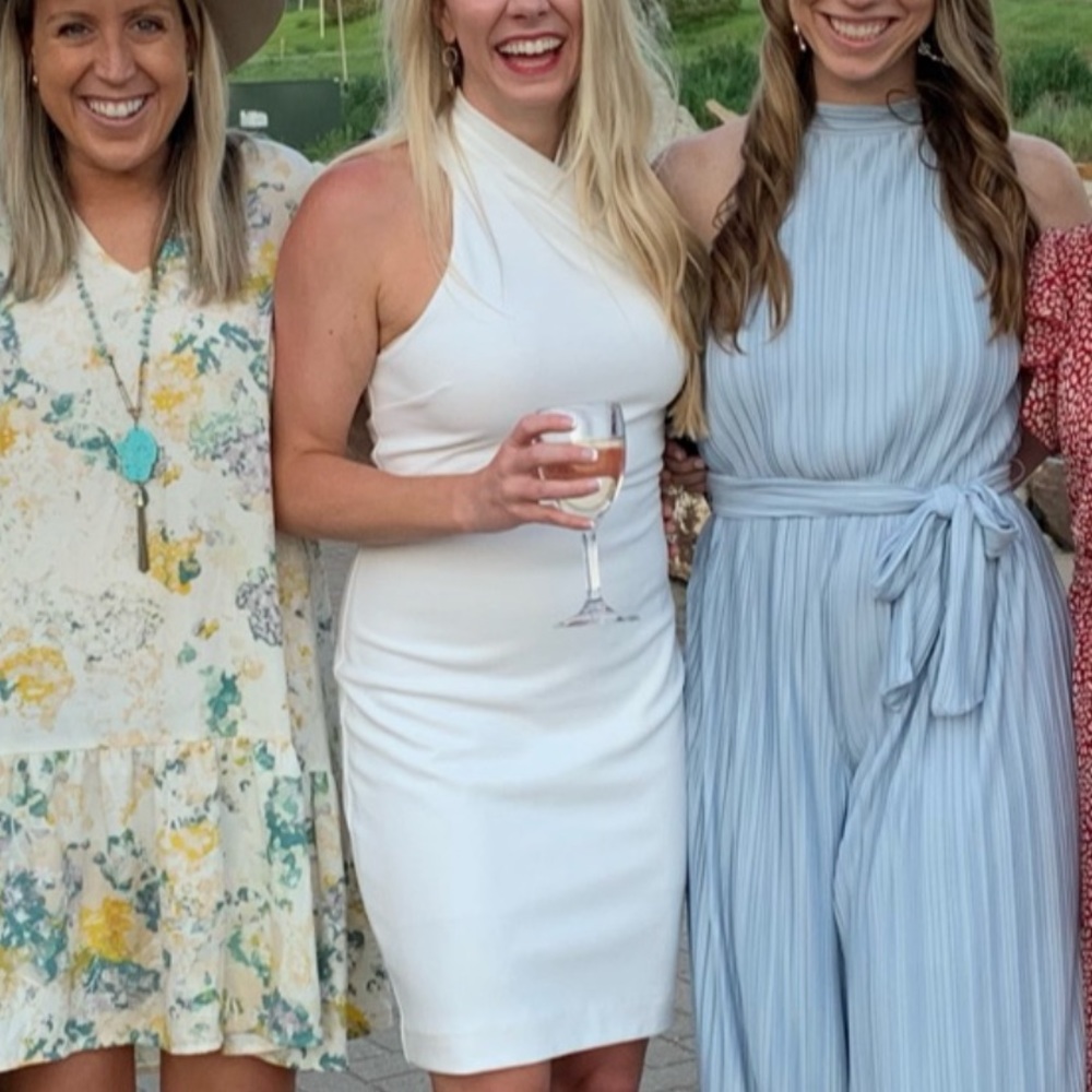 White sleeveless turtleneck dress